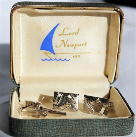 They feature a design with cut out rectangles. . Lord newport cufflinks